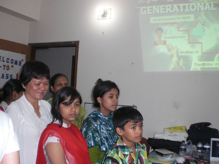 Clare Lim (in white) helping to teach at the Women Encounter